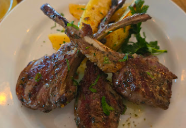 Anassa Taverna Astoria signature dishes Lamb Chops
Classic Greek Salad
Branzino